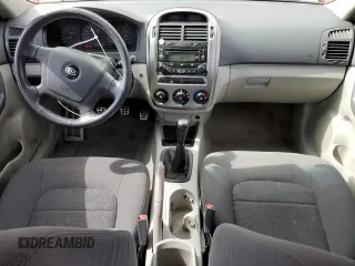 2005 Kia Spectra with VIN KNAFE161455072263, listed as a Copart auction lot 50353204 with 179,957 mi miles and Salvage Title. Bid and sale history available at DreamBid. Image 8.