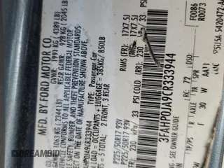 2012 Ford Fusion SEL z VIN 3FAHP0JA9CR333944, wystawiony jako Copart lot #56907605 z przebiegiem 180 386 mil mil oraz Szkoda całkowita • Salvage title. Historia ofert i sprzedaży dostępna na DreamBid. Obrazek 13.
