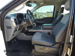 2021 Ford F-150 XL with VIN 1FTFW1E5XMFA47980, listed as a Copart auction lot 56737215 with 63,781 mi miles and Salvage title. Bid and sale history available at DreamBid. Image 7.