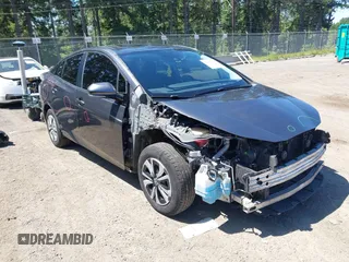 2016 Toyota Prius Four z VIN JTDKARFU1G3001039, wystawiony jako IAAI lot #42396122 z przebiegiem 148 969 mil mil oraz . Historia ofert i sprzedaży dostępna na DreamBid. Obrazek 1.