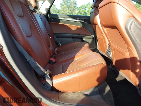 2016 Ford Fusion Titanium with VIN 3FA6P0K92GR210990, listed as a IAAI auction lot 42537176 with 122,111 mi miles and . Bid and sale history available at DreamBid. Image 8.