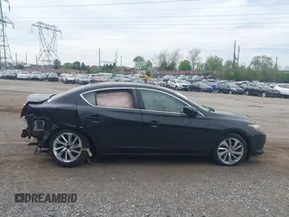 2016 Acura ILX z VIN 19UDE2F30GA005379, wystawiony jako IAAI lot #42079579 z przebiegiem 107 532 mil mil oraz . Historia ofert i sprzedaży dostępna na DreamBid. Obrazek 13.