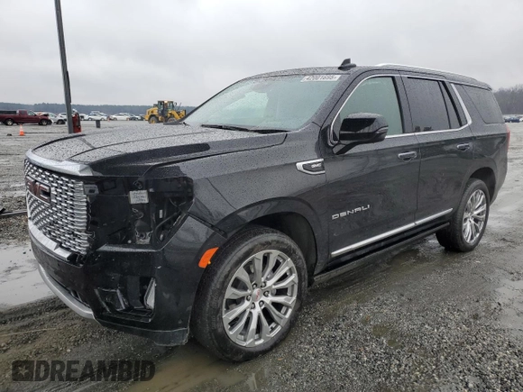 2023 GMC Yukon Denali with VIN 1GKS1DKL8PR402542, listed as a Copart auction lot 42001695 with 23,497 mi miles and Salvage Title. Bid and sale history available at carsss.com. Image 1.