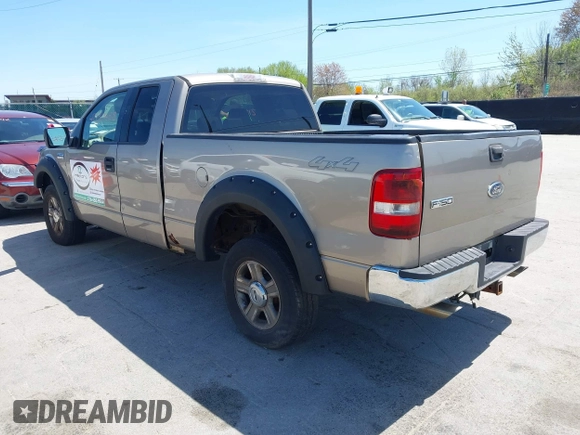 2005 Ford F-150 XLT with VIN 1FTPX14535FB40621, listed as a IAAI auction lot 42130458 with 122,764 mi miles. Bid and sale history available at carsss.com. Image 3.