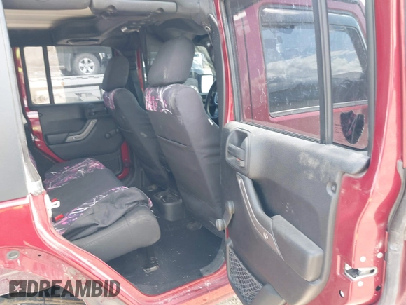 2012 Jeep Wrangler Unlimited Sport z VIN 1C4BJWDG8CL258625, wystawiony jako IAAI lot #42266102 z przebiegiem 58 594 mil mil oraz . Historia ofert i sprzedaży dostępna na DreamBid. Obrazek 8.