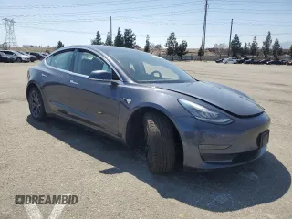 2020 Tesla Model 3 Standard Range Plus z VIN 5YJ3E1EA5LF644296, wystawiony jako Copart lot #56953645 z przebiegiem 89 356 mil mil oraz Szkoda całkowita • Salvage title. Historia ofert i sprzedaży dostępna na DreamBid. Obrazek 4.