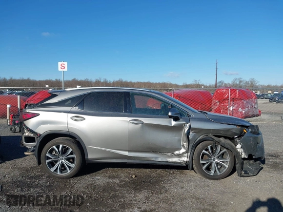 2018 Lexus RX 350 z VIN 2T2BZMCA2JC151645, wystawiony jako IAAI lot #41683204 z przebiegiem 41 838 mil mil oraz . Historia ofert i sprzedaży dostępna na DreamBid. Obrazek 13.