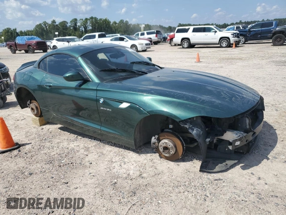 2011 BMW Z4 sDrive30i with VIN WBALM5C55BE495921, listed as a Copart auction lot 71453304 with 116,136 mi miles and Salvage Title. Bid and sale history available at carsss.com. Image 4.