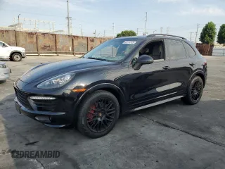 2013 Porsche Cayenne GTS with VIN WP1AD2A2XDLA79684, listed as a Copart auction lot 65514705 with Not provided miles and Salvage title. Bid and sale history available at DreamBid. Image 1.