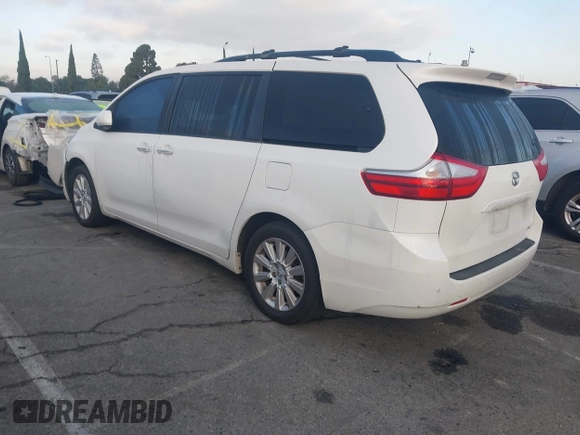 2015 Toyota Sienna Ltd with VIN 5TDDK3DC8FS100841, listed as a IAAI auction lot 41539557 with 219,816 mi miles. Bid and sale history available at carsss.com. Image 3.