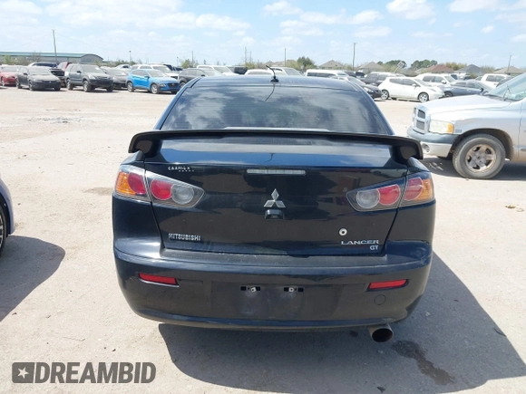 2016 Mitsubishi Lancer GT with VIN JA32U8FW8GU011501, listed as a IAAI auction lot 41779016 with 153,082 mi miles. Bid and sale history available at carsss.com. Image 16.