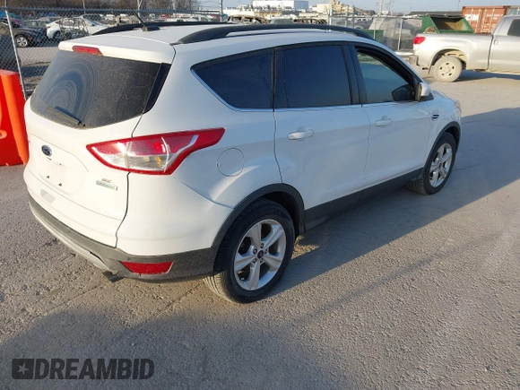 2016 Ford Escape SE with VIN 1FMCU9GX0GUC03719, listed as a IAAI auction lot 41781963 with 85,382 mi miles. Bid and sale history available at carsss.com. Image 4.