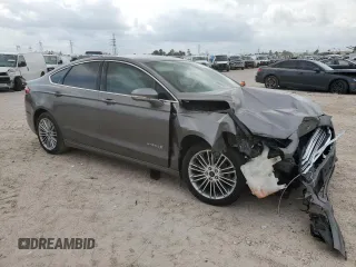 2014 Ford Fusion SE Hybrid with VIN 3FA6P0LU8ER343625, listed as a Copart auction lot 54844285 with 181,631 mi miles and Salvage Title. Bid and sale history available at DreamBid. Image 4.