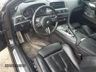 2015 BMW M6 z VIN WBSLX9C57FD160701, wystawiony jako Copart lot #57118924 z przebiegiem 60 271 mil mil oraz Tytuł czysty. Historia ofert i sprzedaży dostępna na DreamBid. Obrazek 8.
