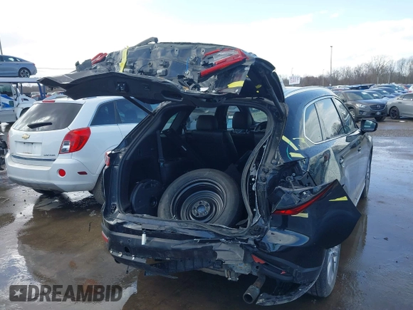 2020 Mazda CX-9 Grand Touring with VIN JM3TCBDY2L0413839, listed as a IAAI auction lot 41720713 with 48,964 mi miles and . Bid and sale history available at DreamBid. Image 6.