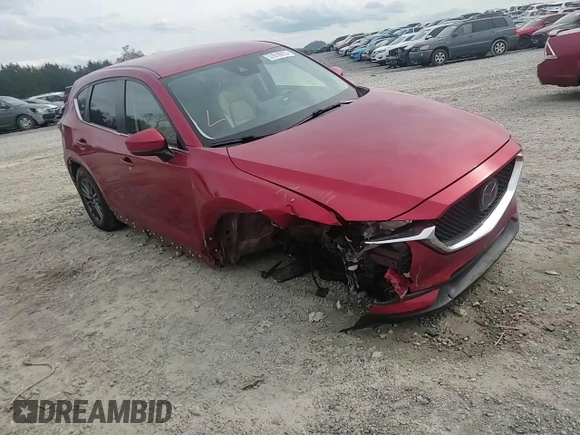 2021 Mazda CX-5 Touring with VIN JM3KFACM7M0334633, listed as a Copart auction lot 51618875 with 70,558 mi miles and Salvage Title. Bid and sale history available at DreamBid. Image 11.