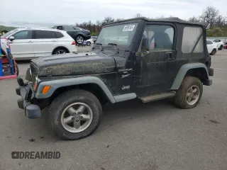 1999 Jeep Wrangler Sport z VIN 1J4FY19S2XP423722, wystawiony jako Copart lot #56098165 z przebiegiem 119 586 mil mil oraz Czysty tytuł • Clean title. Historia ofert i sprzedaży dostępna na DreamBid. Obrazek 1.