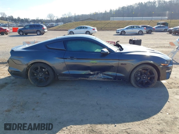 2018 Ford Mustang GT z VIN 1FA6P8CF4J5158775, wystawiony jako IAAI lot #41627780 z przebiegiem 65 519 mil mil oraz . Historia ofert i sprzedaży dostępna na DreamBid. Obrazek 13.