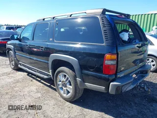 2002 Chevrolet Suburban LT with VIN 3GNFK16Z52G264577, listed as a IAAI auction lot 41881062 with 321,321 mi miles. Bid and sale history available at carsss.com. Image 3.