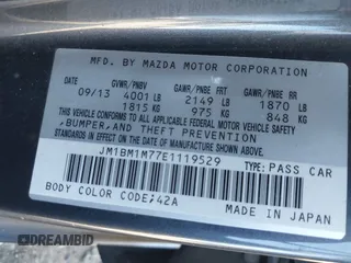 2014 Mazda 3 i Grand Touring with VIN JM1BM1M77E1119529, listed as a IAAI auction lot 41399739 with 126,931 mi miles and . Bid and sale history available at DreamBid. Image 9.