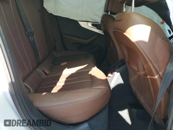 2018 Audi A4 Premium Plus с VIN WAUENAF44JA129472, выставлен на аукционе Copart как лот 50470795 с пробегом Не указан миль и Списание • Salvage title. История ставок и продаж доступна на DreamBid. Изображение 11.