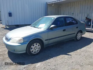 1999 Honda Civic LX z VIN 2HGEJ667XXH575496, wystawiony jako IAAI lot #42372107 z przebiegiem 175 154 mil mil oraz . Historia ofert i sprzedaży dostępna na DreamBid. Obrazek 2.