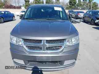 2013 Dodge Journey SE with VIN 3C4PDCAB7DT730744, listed as a IAAI auction lot 41900114 with 186,086 mi miles and . Bid and sale history available at DreamBid. Image 6.