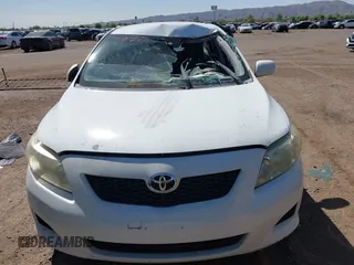 2009 Toyota Corolla with VIN JTDBL40E699058755, listed as a IAAI auction lot 42564996 with 211,526 mi miles and . Bid and sale history available at DreamBid. Image 6.