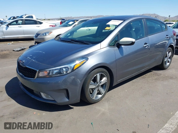 2018 Kia Forte LX with VIN 3KPFL4A77JE220538, listed as a IAAI auction lot 42095964 with 98,977 mi miles and . Bid and sale history available at DreamBid. Image 17.