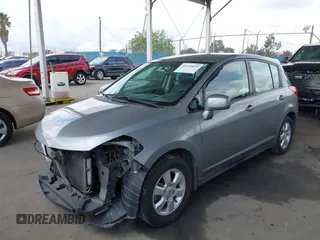 2009 Nissan Versa 1.8 S with VIN 3N1BC13E39L391774, listed as a IAAI auction lot 41925859 with 132,019 mi miles. Bid and sale history available at carsss.com. Image 2.