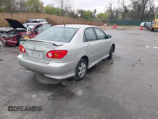 2003 Toyota Corolla CE with VIN 2T1BR32E13C038971, listed as a IAAI auction lot 42027458 with 227,808 mi miles. Bid and sale history available at carsss.com. Image 4.