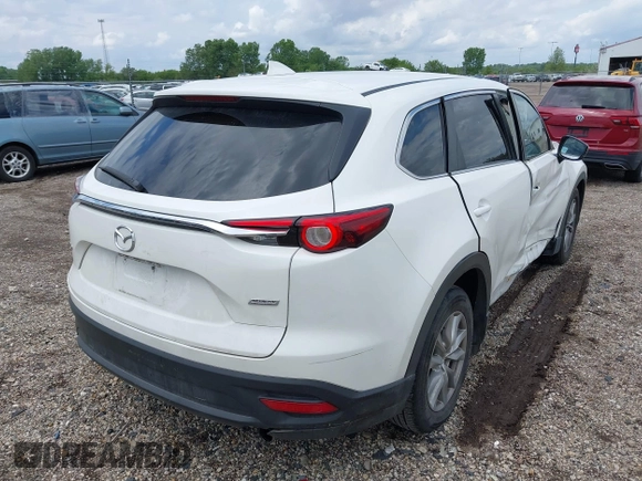 2016 Mazda CX-9 Sport with VIN JM3TCABY4G0100620, listed as a IAAI auction lot 42316216 with 191,245 mi miles and . Bid and sale history available at DreamBid. Image 4.