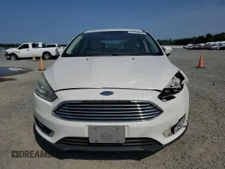 2015 Ford Focus Titanium с VIN 1FADP3N24FL214429, выставлен на аукционе Copart как лот 59159075 с пробегом 157 353 миль миль и Списание • Salvage title. История ставок и продаж доступна на DreamBid. Изображение 5.