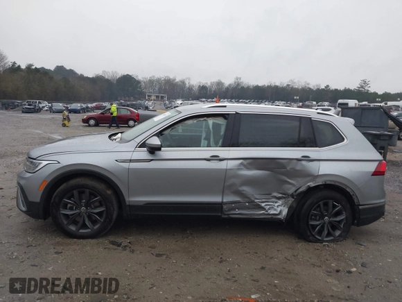 2023 Volkswagen Tiguan SE with VIN 3VV3B7AX6PM032195, listed as a IAAI auction lot 41867087 with 29,860 mi miles and . Bid and sale history available at DreamBid. Image 14.