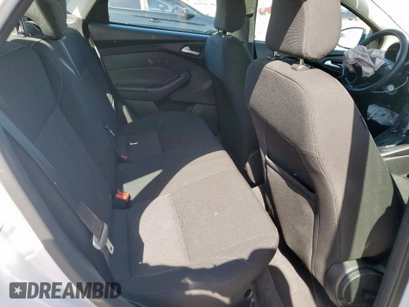 2018 Ford Focus SE z VIN 1FADP3F29JL225126, wystawiony jako Copart lot #52817265 z przebiegiem Nie podano mil oraz Szkoda całkowita • Salvage title. Historia ofert i sprzedaży dostępna na DreamBid. Obrazek 10.