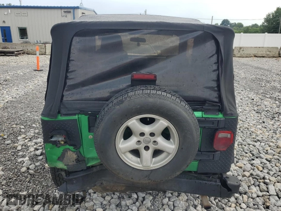 2004 Jeep Wrangler SE with VIN 1J4FA29124P769475, listed as a Copart auction lot 64371244 with 136,877 mi miles and Salvage title. Bid and sale history available at DreamBid. Image 6.