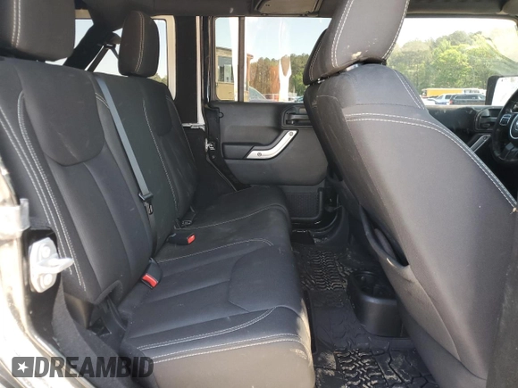 2016 Jeep Wrangler Unlimited Rubicon with VIN 1C4BJWFG5GL290757, listed as a Copart auction lot 52099225 with 102,424 mi miles and Salvage title. Bid and sale history available at DreamBid. Image 11.