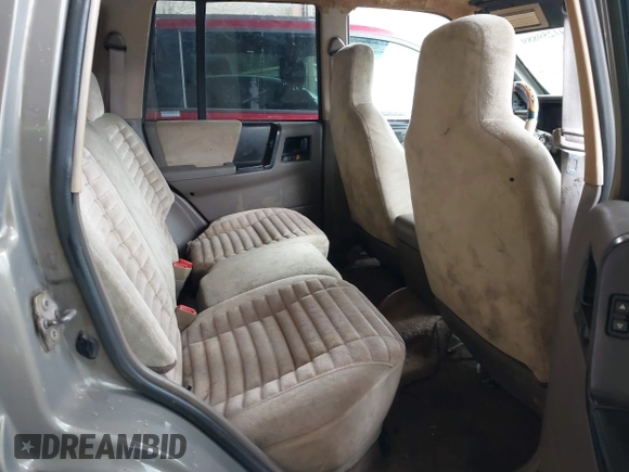 1995 Jeep Grand Cherokee Laredo with VIN 1J4GZ58SXSC697003, listed as a IAAI auction lot 41259889 with 248,595 mi miles. Bid and sale history available at carsss.com. Image 8.