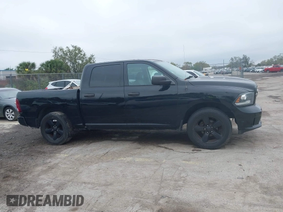 2014 Ram 1500 Express z VIN 1C6RR6KT3ES383099, wystawiony jako IAAI lot #41665232 z przebiegiem 139 043 mil mil oraz . Historia ofert i sprzedaży dostępna na DreamBid. Obrazek 13.