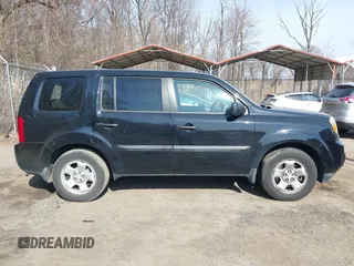 2014 Honda Pilot LX with VIN 5FNYF4H22EB015512, listed as a IAAI auction lot 41753515 with 152,287 mi miles and . Bid and sale history available at DreamBid. Image 13.
