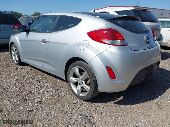 2012 Hyundai Veloster w/Black Int with VIN KMHTC6AD4CU021595, listed as a IAAI auction lot 42004371 with 149,637 mi miles. Bid and sale history available at carsss.com. Image 3.