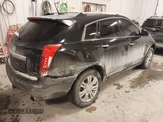2014 Cadillac SRX Luxury Collection with VIN 3GYFNBE38ES518247, listed as a IAAI auction lot 41475294 with Not Provided miles and . Bid and sale history available at carsss.com. Image 4.