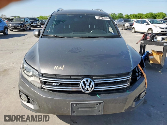 2014 Volkswagen Tiguan SEL z VIN WVGAV3AX6EW030705, wystawiony jako Copart lot #52156805 z przebiegiem 142 377 mil mil oraz Szkoda całkowita • Salvage title. Historia ofert i sprzedaży dostępna na DreamBid. Obrazek 5.