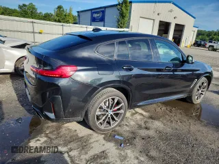 2021 BMW X4 M40i with VIN 5UX2V5C05M9F68427, listed as a Copart auction lot 64941095 with 50,208 mi miles and Salvage title. Bid and sale history available at DreamBid. Image 3.