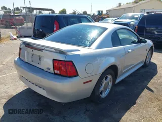 2004 Ford Mustang Standard with VIN 1FAFP40654F140281, listed as a IAAI auction lot 42732286 with 145,723 mi miles and . Bid and sale history available at DreamBid. Image 4.