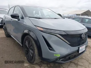 2023 Nissan ARIYA Premiere z VIN JN1BF0BA5PM408917, wystawiony jako IAAI lot #42041650 z przebiegiem 18 523 mil mil oraz . Historia ofert i sprzedaży dostępna na DreamBid. Obrazek 1.