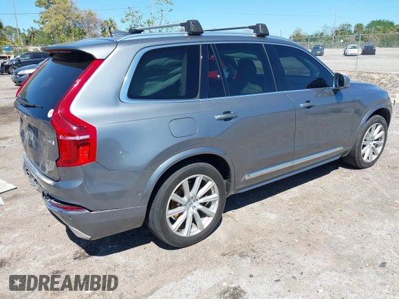 2016 Volvo XC90 T6 Inscription with VIN YV4A22PL4G1034597, listed as a IAAI auction lot 41787550 with 118,744 mi miles. Bid and sale history available at carsss.com. Image 4.