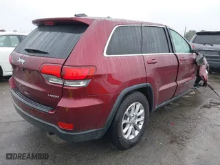 2021 Jeep Grand Cherokee Laredo X with VIN 1C4RJEAG4MC681989, listed as a IAAI auction lot 41571341 with 61,090 mi miles. Bid and sale history available at carsss.com. Image 4.