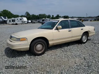 1996 Ford Crown Victoria LX с VIN 2FALP74W1TX192976, выставлен на аукционе Copart как лот 56104895 с пробегом 144 011 миль миль и Списание • Salvage title. История ставок и продаж доступна на DreamBid. Изображение 1.