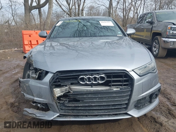 2017 Audi A6 Premium Plus z VIN WAUF2AFC7HN007745, wystawiony jako IAAI lot #41647523 z przebiegiem 119 837 mil mil oraz . Historia ofert i sprzedaży dostępna na DreamBid. Obrazek 12.